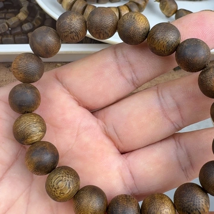 厚***物手串沉香张勺子手串9克加