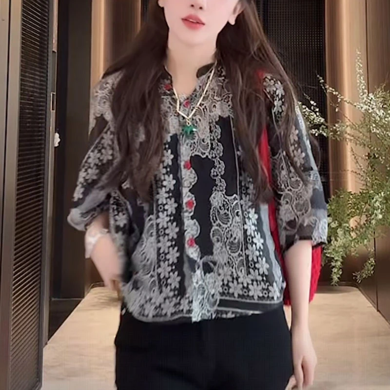 黑色印花v领休闲衬衫女士夏季2025新款时尚减龄洋气显瘦遮肚上衣