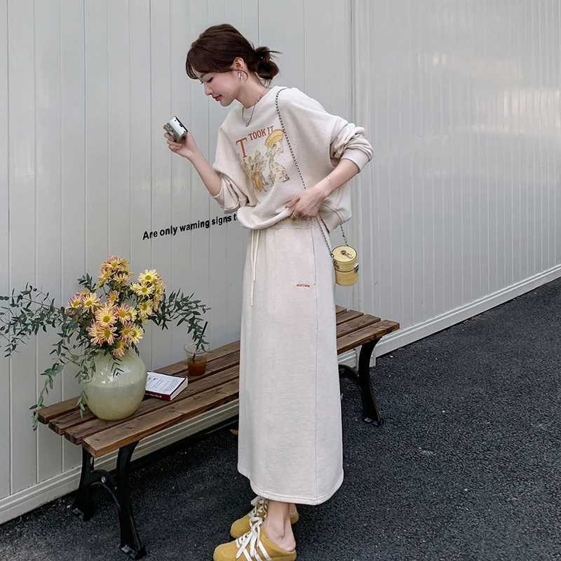 休闲气质卡通图片卫衣套装女春2025新款减龄搭配炸街半身裙两件套