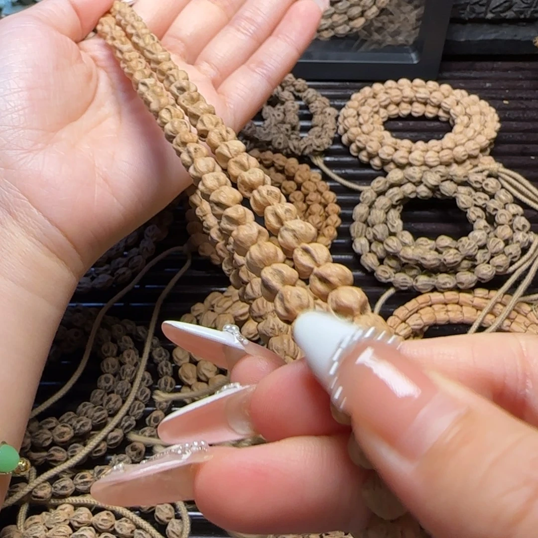 两***樂吊坠柏香籽/百香籽