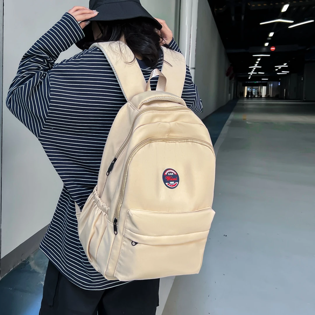 高级感经典双肩大容量背包男女通用情侣上课外出户外通勤学生书包