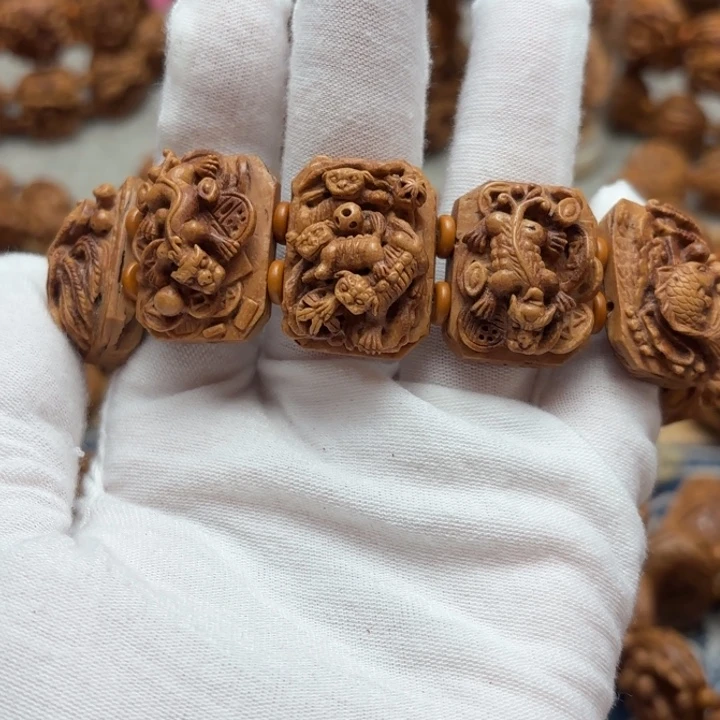 桃核雕刻十大神兽手牌