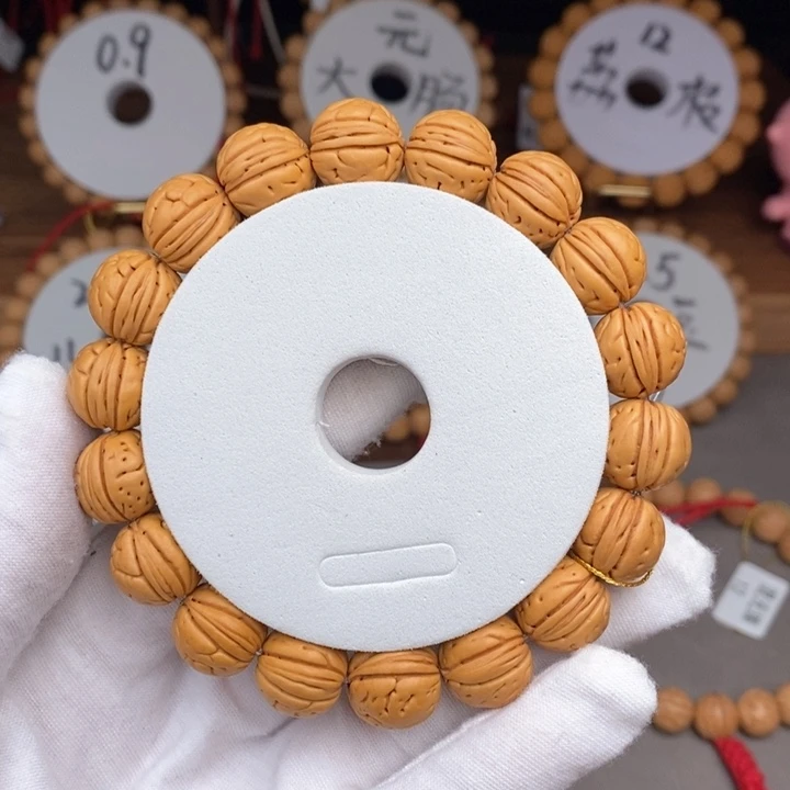 桃核手串黄元帅13.5A抛光尺寸误差0.5之间