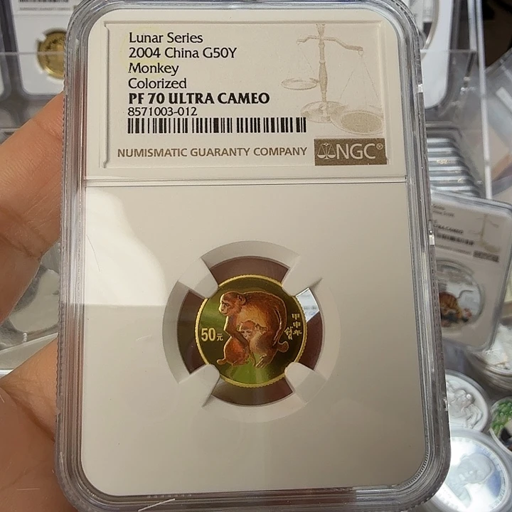 纯金2004年彩金猴带证书NGC70分