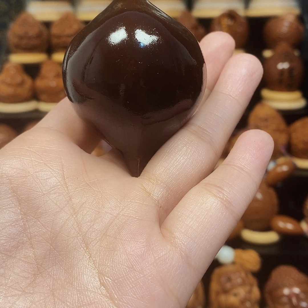 橄榄核吊坠奥*牛玉华44尺单颗素核000999