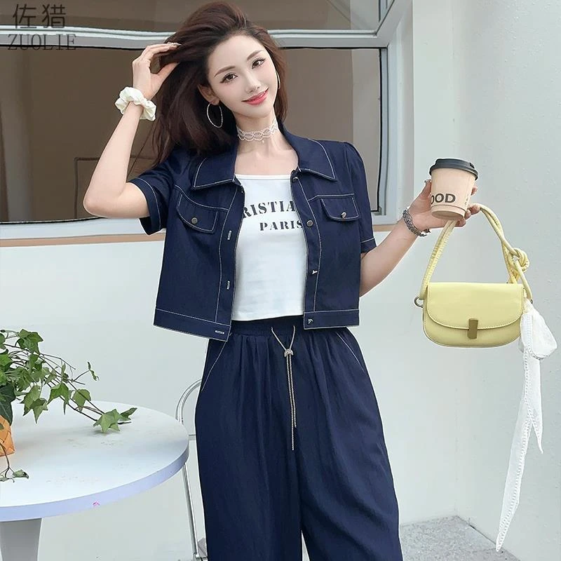 显示复古减龄牛仔套装女2025夏季新款短袖短外套吊带阔腿裤三件套