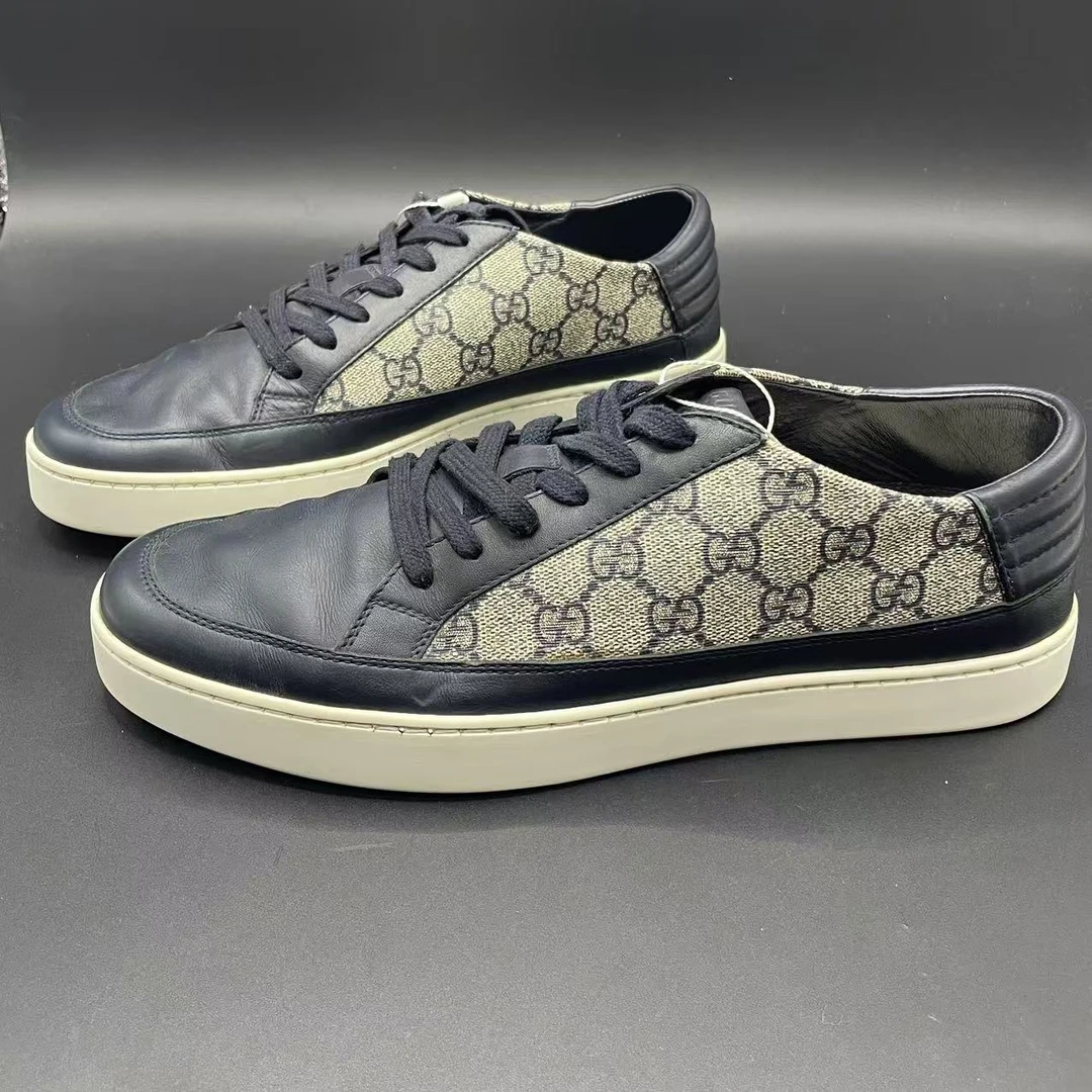 95新 GUCCI/古驰 男士侧边藏蓝老花半印低帮板鞋41.5欧码 cat912