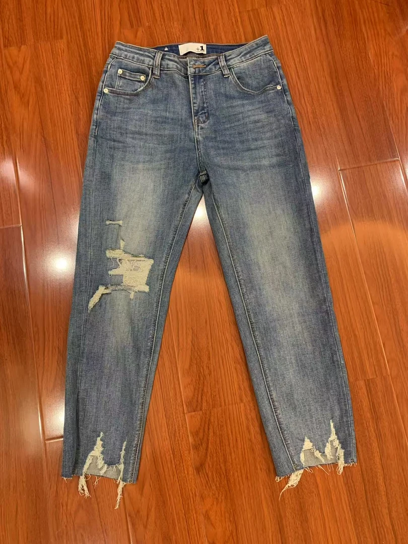 破洞碎边牛仔烟管裤