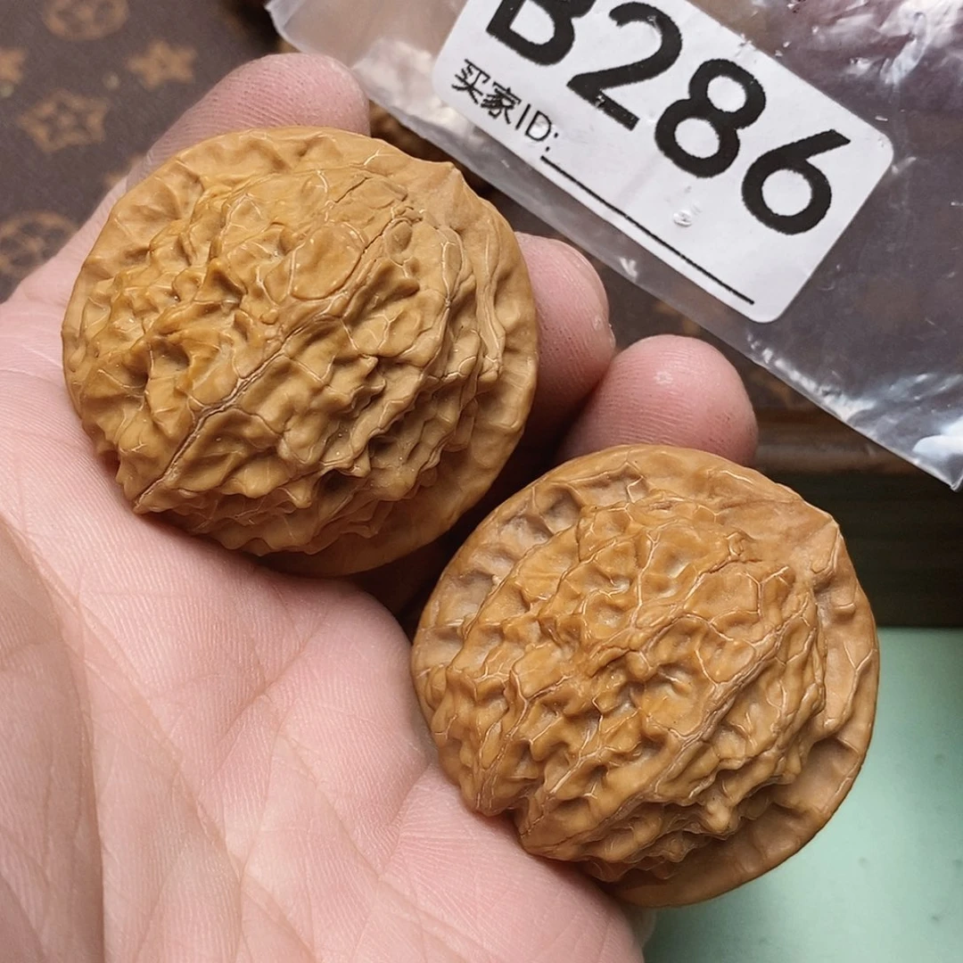 把件文玩核桃金麒麟39尺。