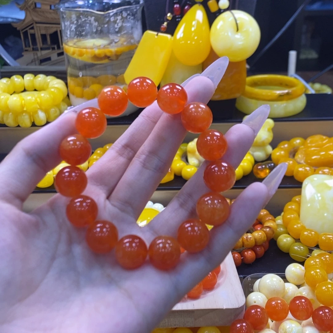 小***一精品卡14蜜橘红手串