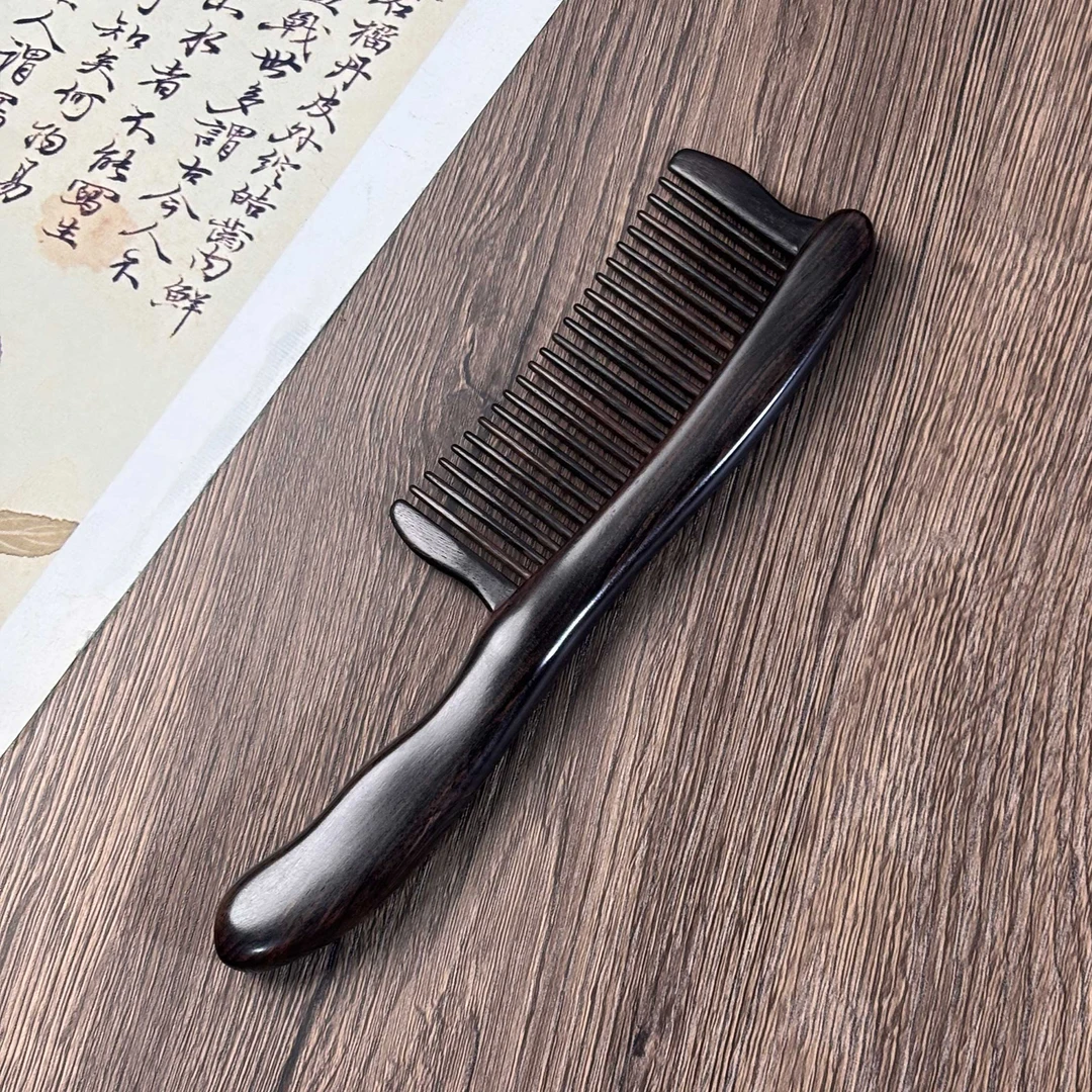 黑檀紫光檀插齿按摩木梳女士长发便携实木梳家用顺发