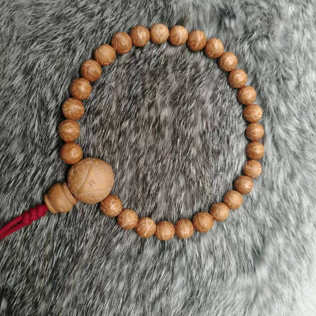 尺寸7+mm左右国产凤眼酸枣核大眼萌手持一条《小鱼文玩》B049