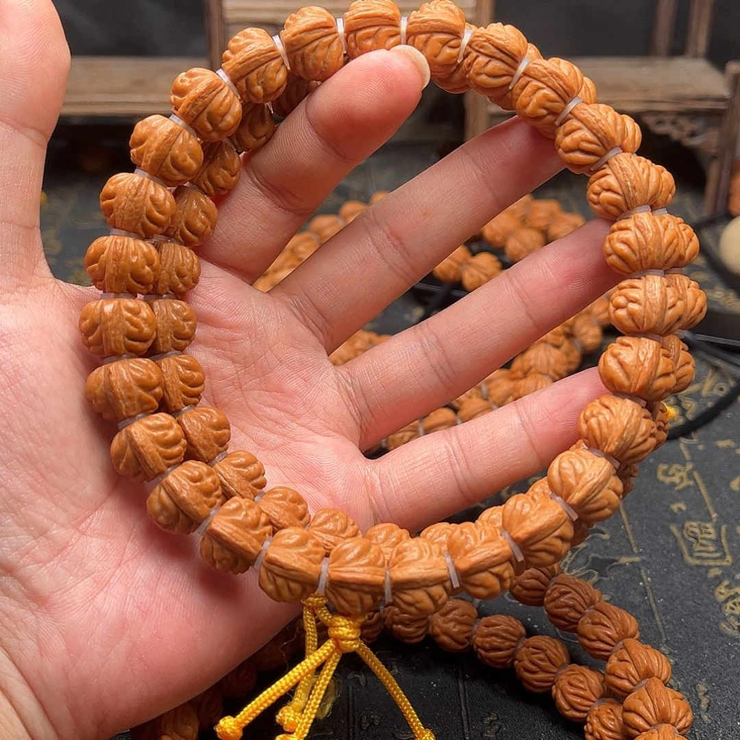 桃核吊坠小金豆手持