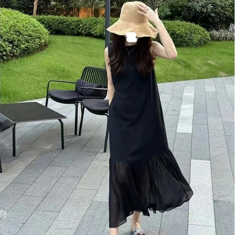 法式赫本风黑色无袖连衣裙女2025夏季新款高级感网纱拼接宽松长裙
