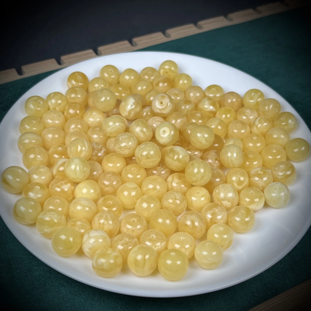 B016天然原矿俄料蜜蜡老型墩 约11X9MM  1个装发货