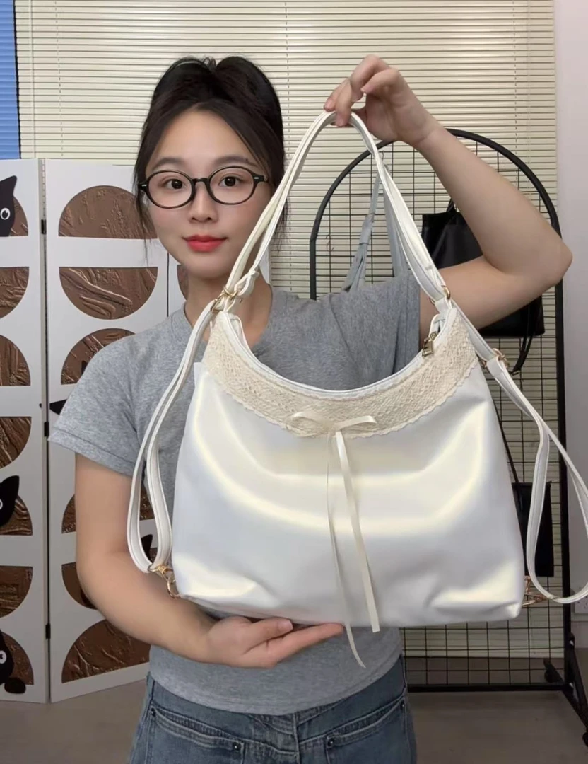 178文艺少女系蝴蝶结单肩腋下包学院风双肩包