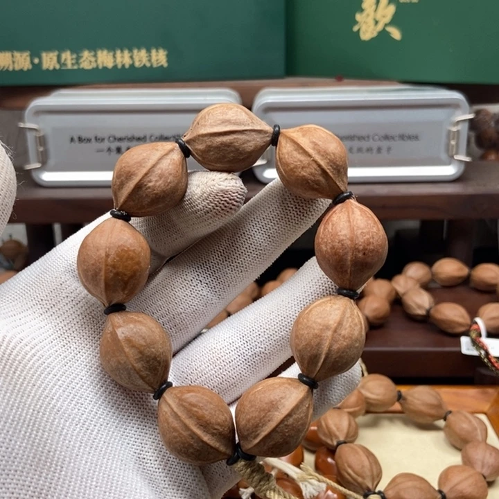 柠***团手串橄榄核2027三花