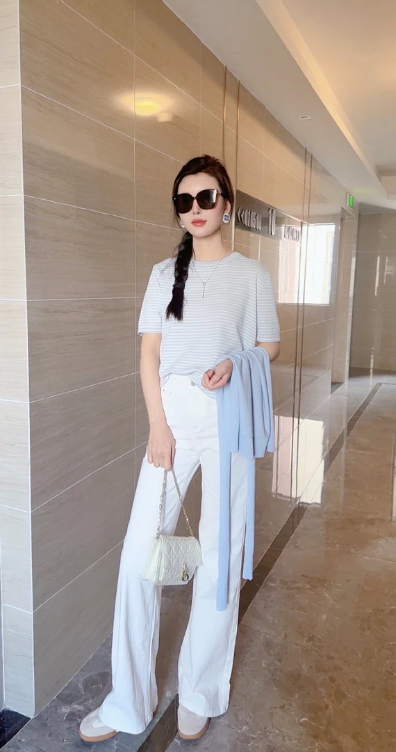 美式高腰不贴腿微喇牛仔裤女2025最新款 通勤高级感白色牛仔裤