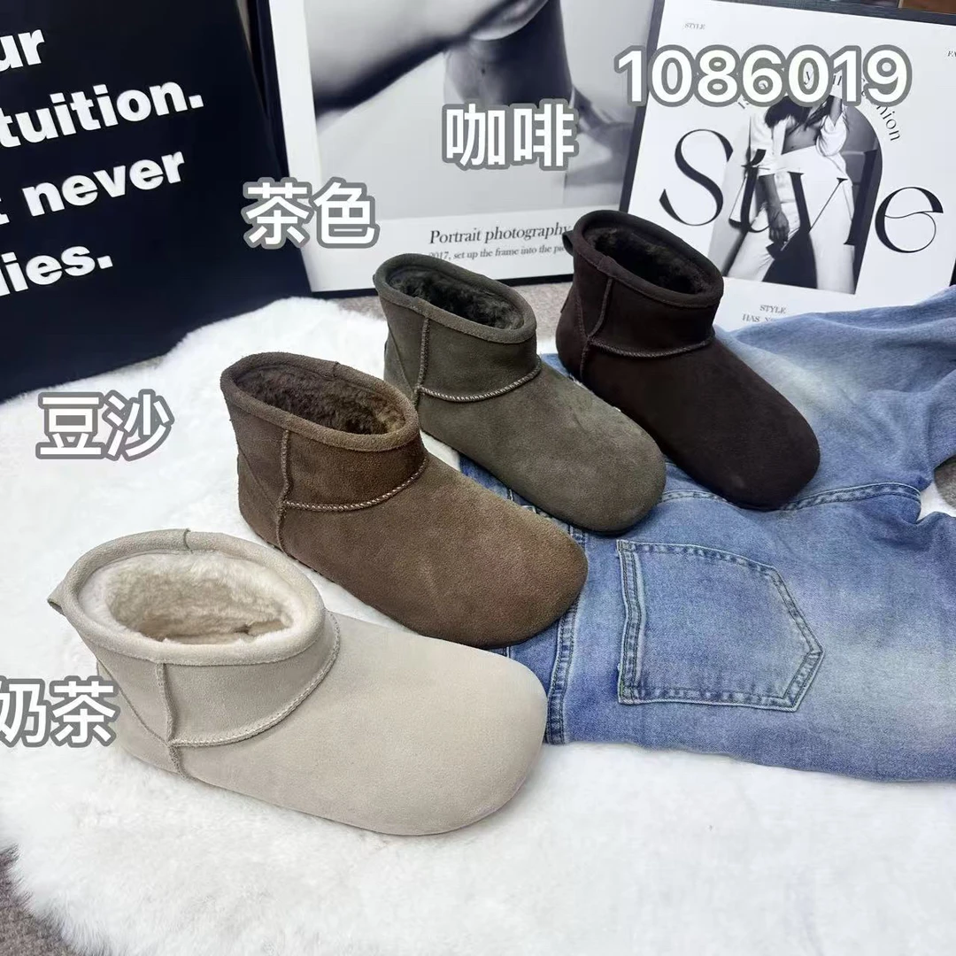 1086019冬季大棉一脚蹬套筒平底时尚休闲真皮女士短靴