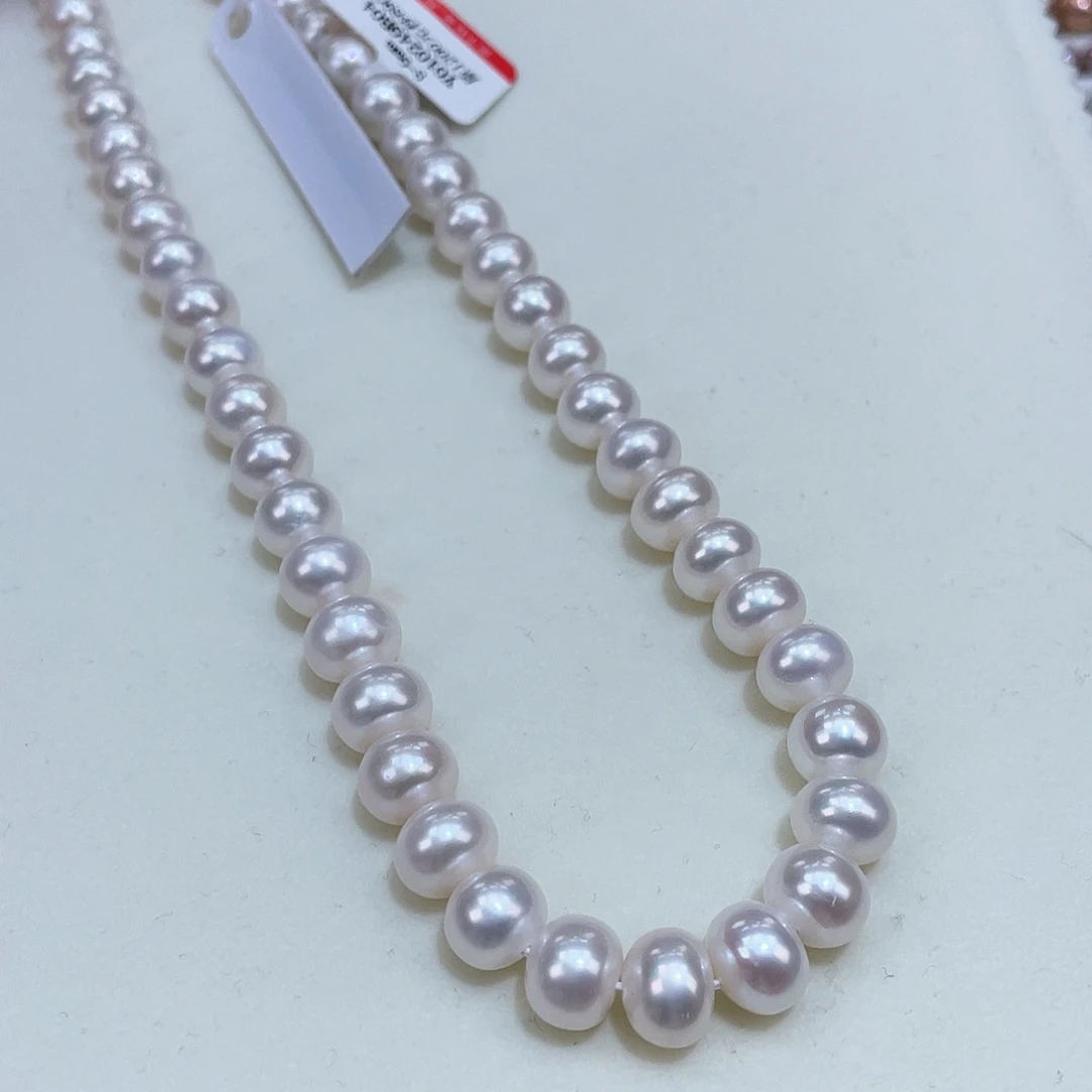 淡水珍珠8/9近圆镜面冷白光赛澳白银S925镶嵌