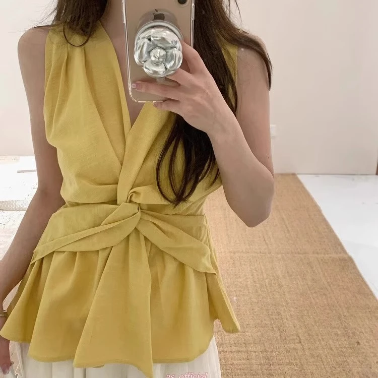 2025夏季新款度假风小众修身别致无袖上衣as设计感扭结V领背心女