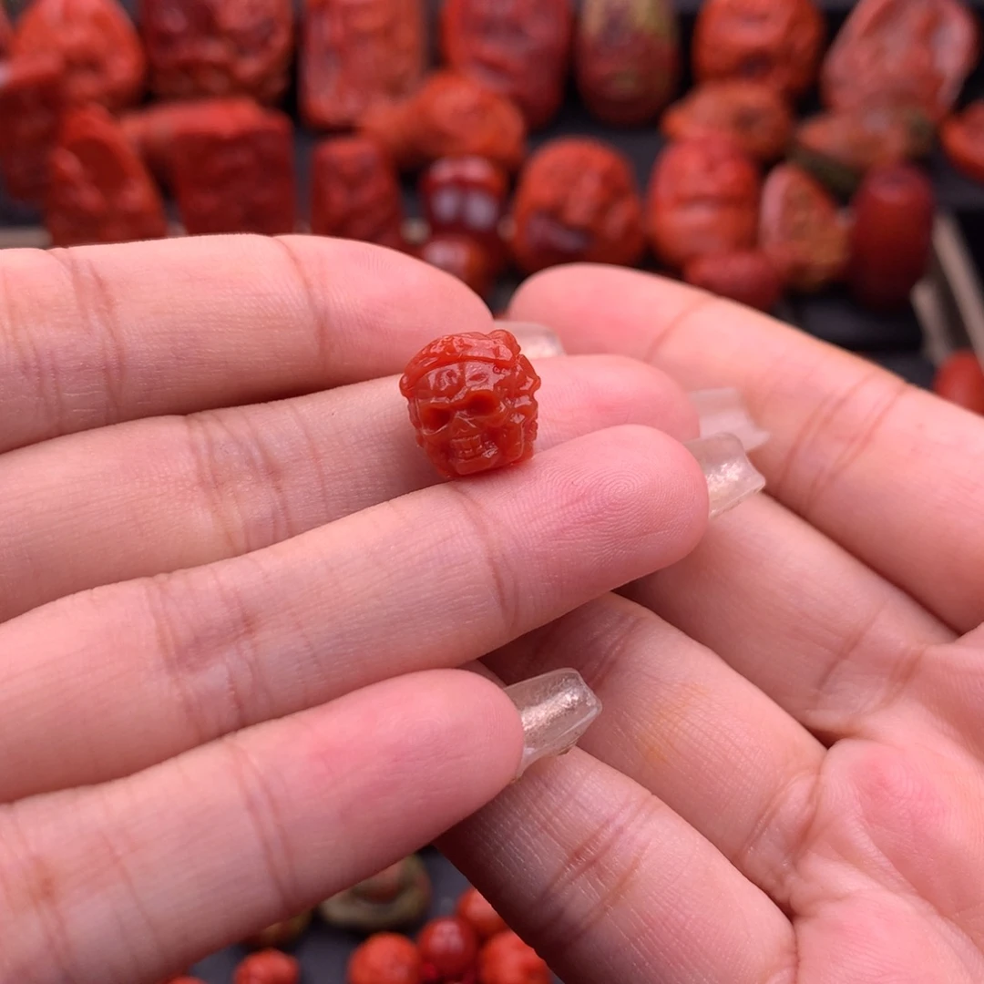 南红玛瑙南红川料原矿三面骷髅头11.5mm未镶嵌