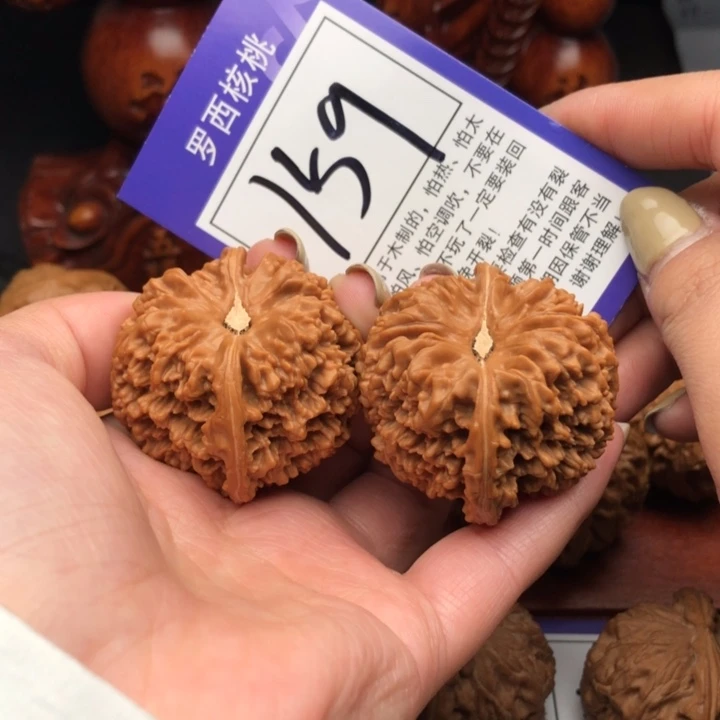 桃核把件爱***兴42满天星159号牌