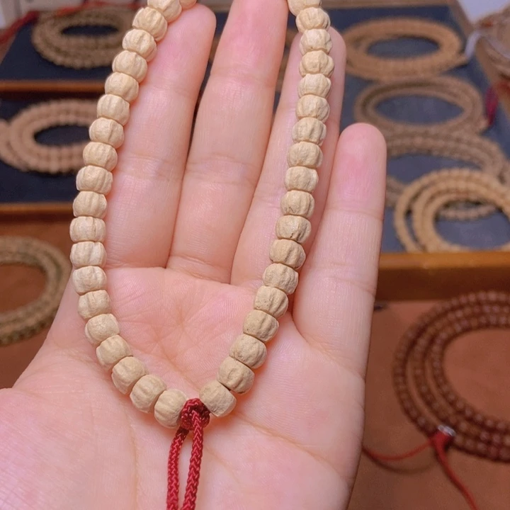 柏香籽/百香籽吊坠手持