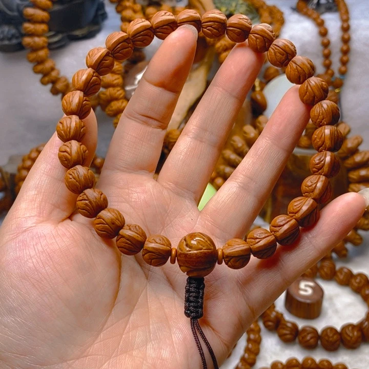 桃核手串红皮玉龙脊手持