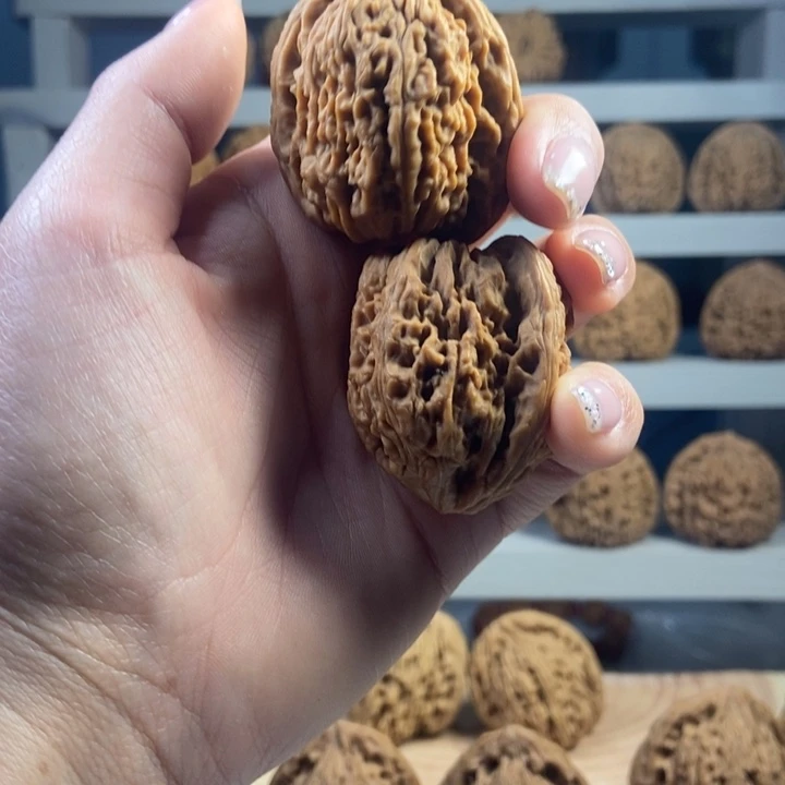 一***花文玩核桃吊坠正宗南疆石文玩核桃