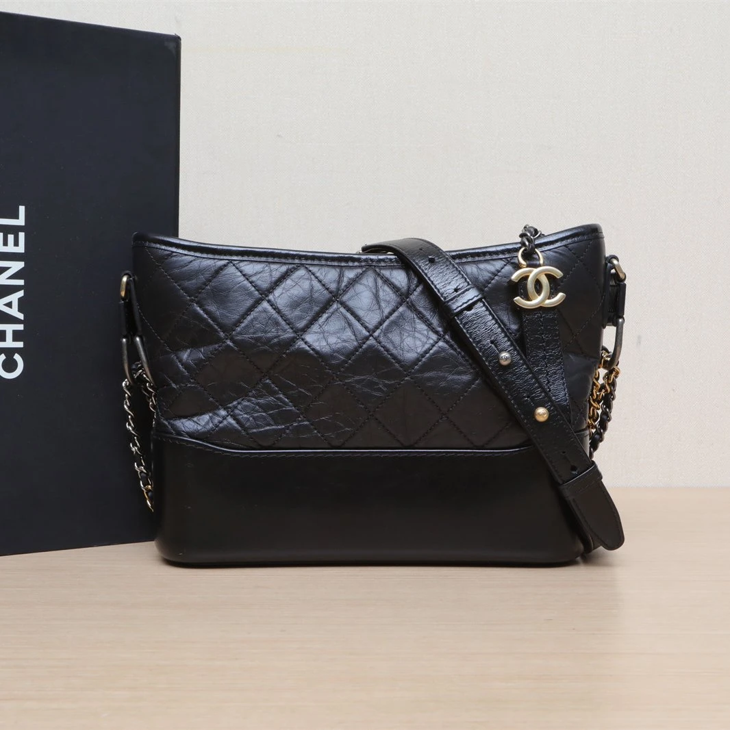 95新 Chanel/香奈儿 小花黑黑 流浪包 新中号 黑色 29开 金银扣