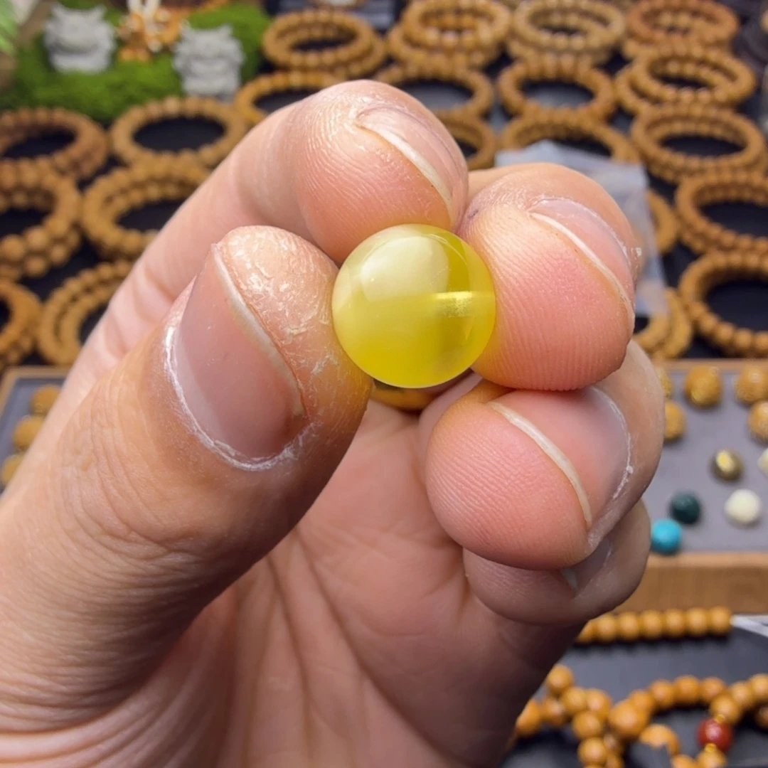 唔***文吊坠猴头核桃配饰蜡