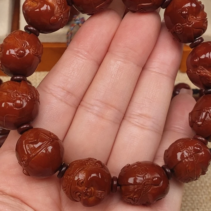 S***头橄榄核吊坠地主老财头