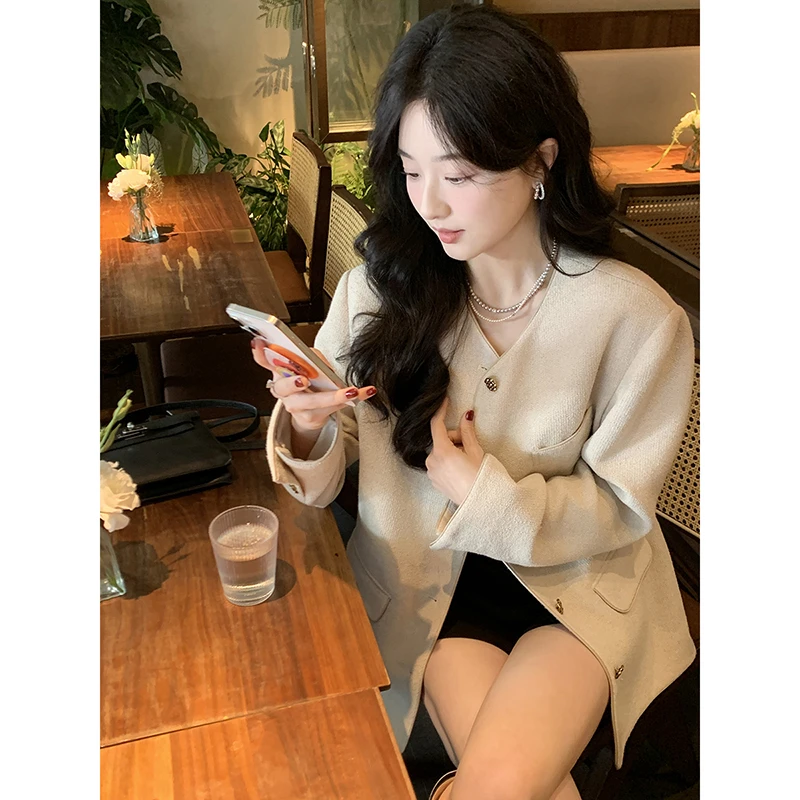 夏诗文 仿麻感编织肌理圆领宽松垫肩西装外套女春季