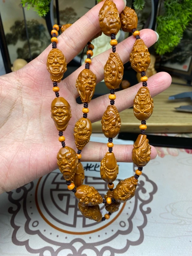 橄榄核雕工艺手串宇十八罗汉脖挂