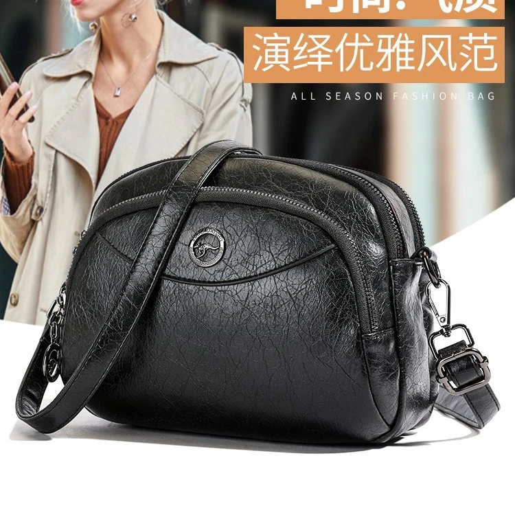贝壳包女2025新款真皮潮时尚百搭软牛皮多隔层简约单肩斜挎小包包