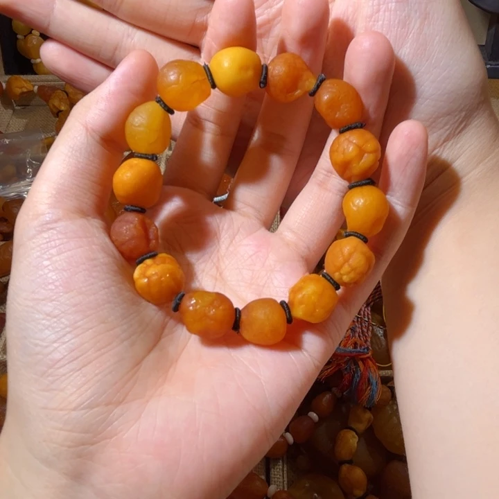 俊***朗未镶嵌颈饰琥珀蜜蜡海漂手串
