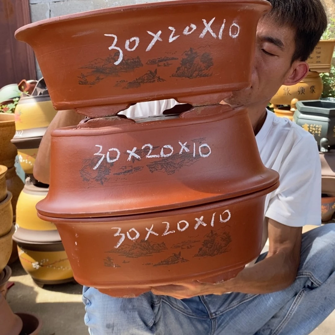 紫砂花盆紫砂艺术学院的学生会