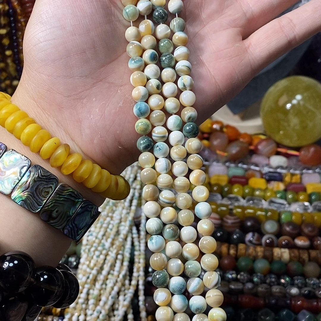 石英质玉未镶嵌，天然蓝翡色夜光螺7.7mm，