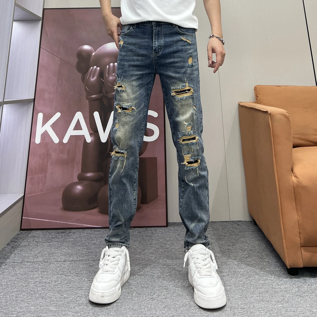 秋冬新款潮牌复古蓝高品质贴布假破洞个性痞帅男士小脚修身牛仔裤