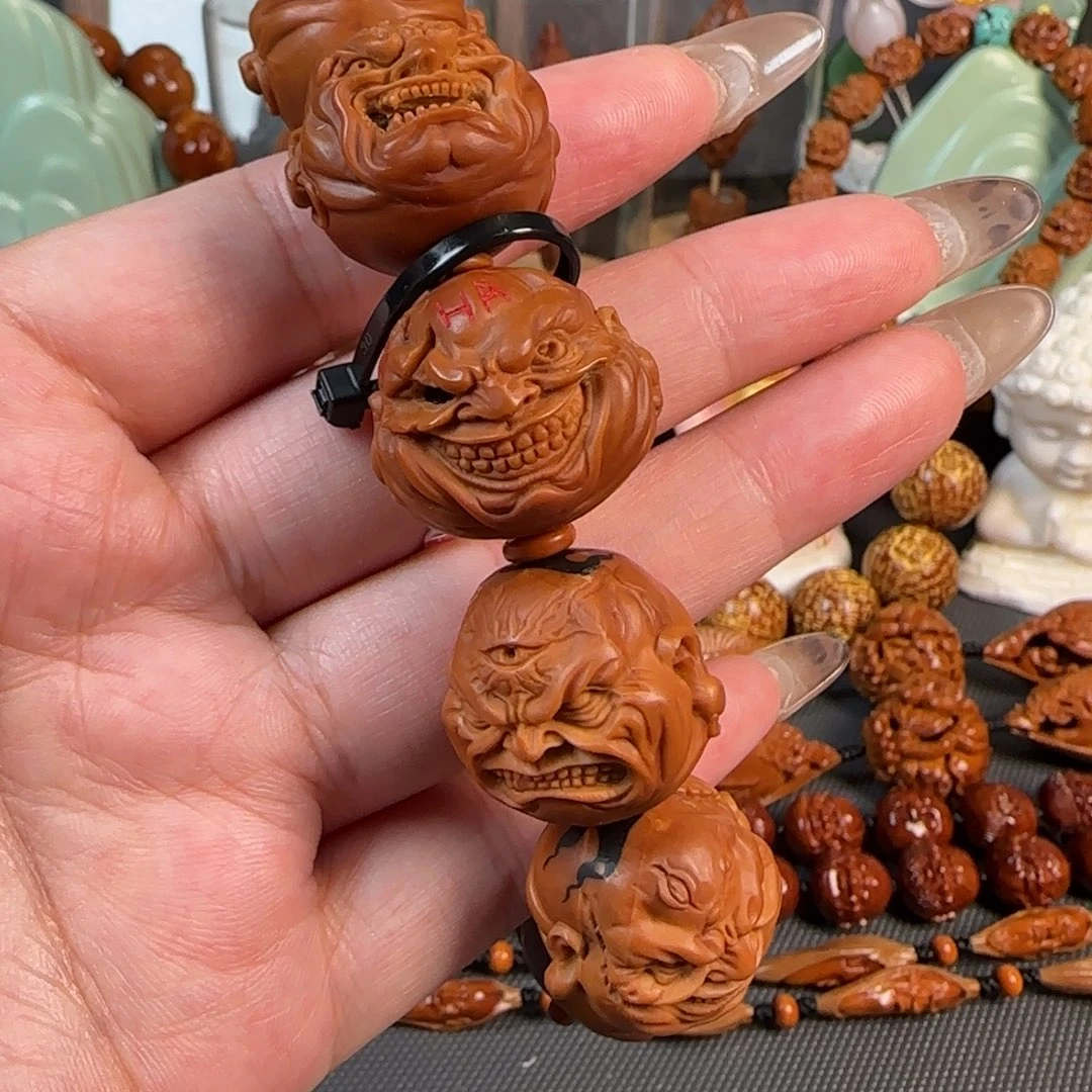 橄榄核手串/手链宽2.3-2.4鸡血红梅林核佛爷恶僧