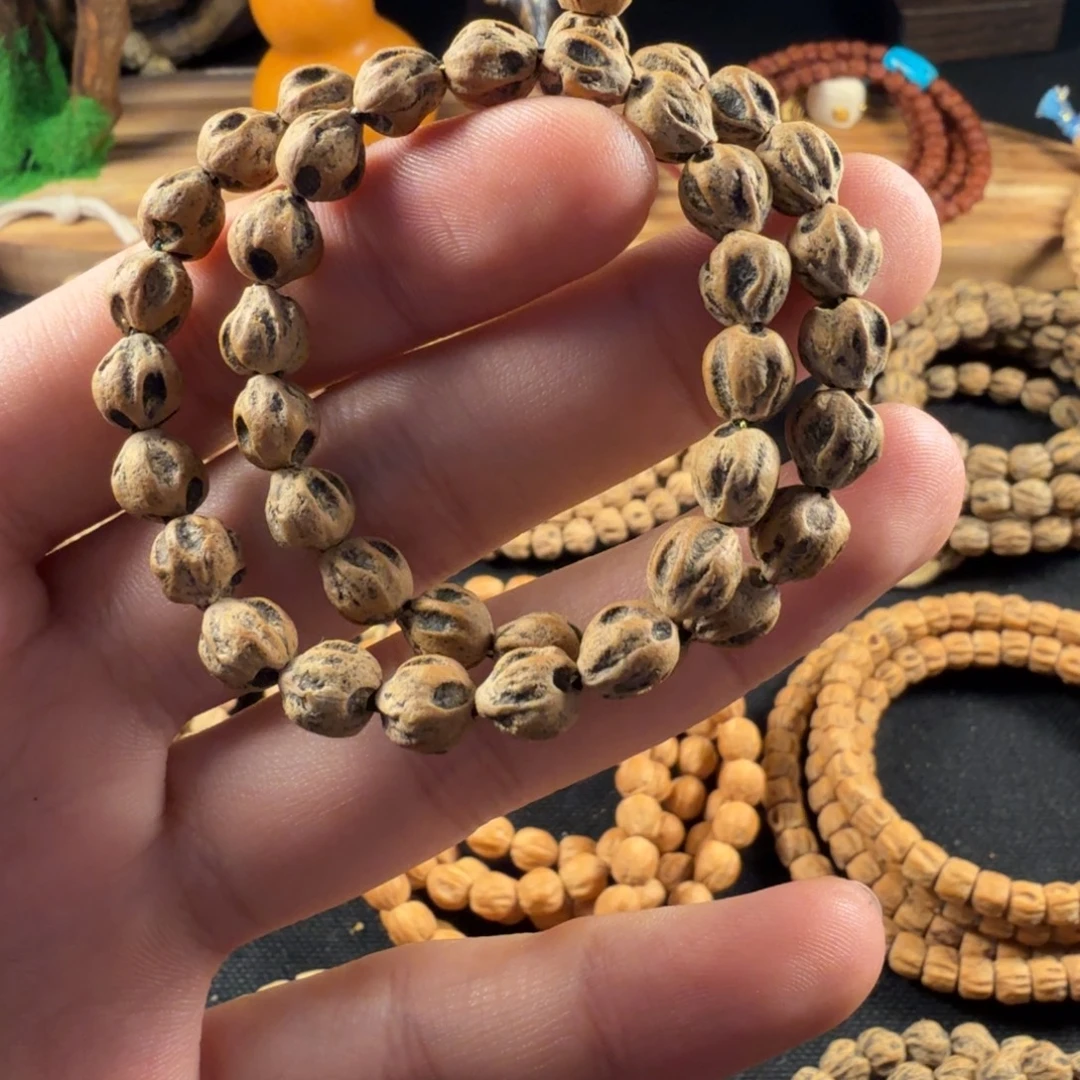 陈***橙吊坠柏香籽/百香籽