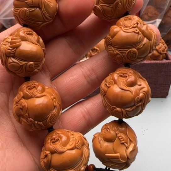 橄榄核手串音**烧雕刻工艺