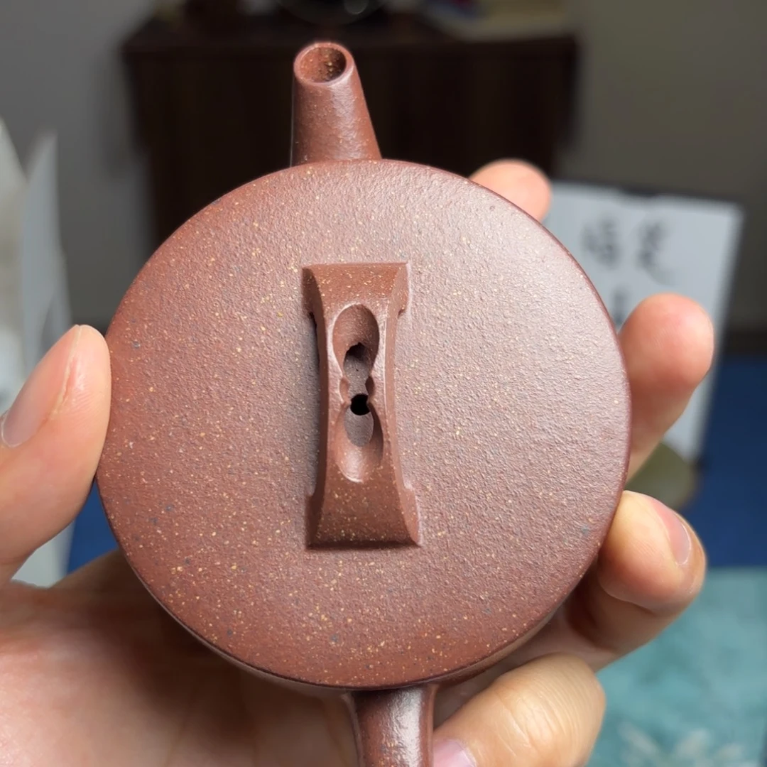 茶盏所有人半手紫砂壶一把