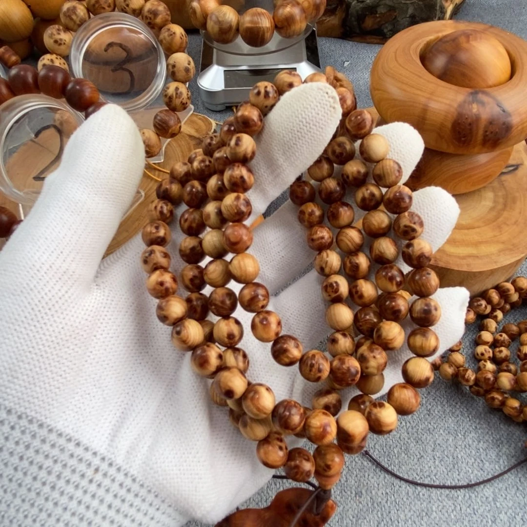 崖柏明***好0.8榴花108珠