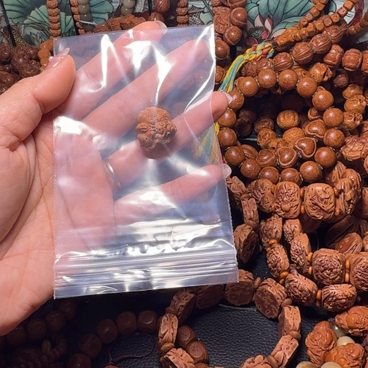 桃核吊坠兽面左右孔