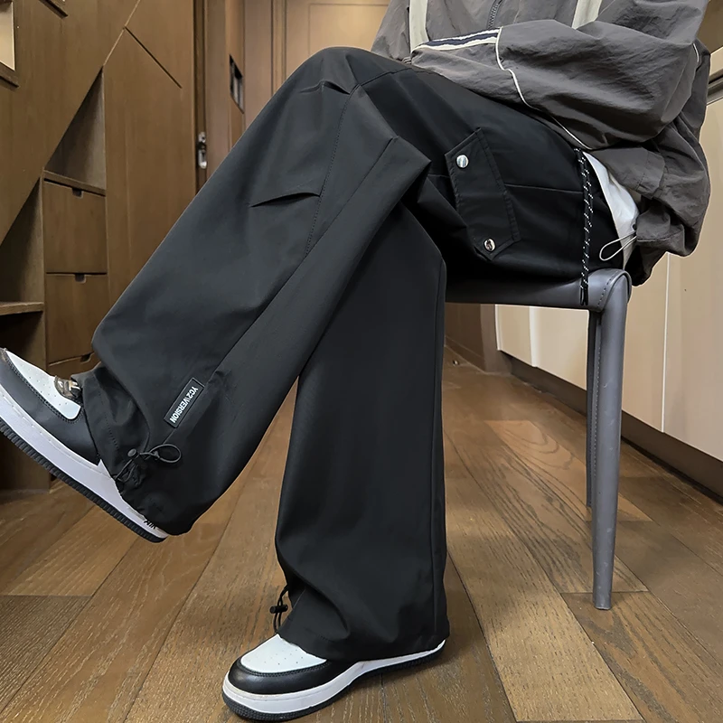 防泼水冲锋工装裤子男士春秋季潮流抽绳设计宽松垂感伞兵休闲长裤
