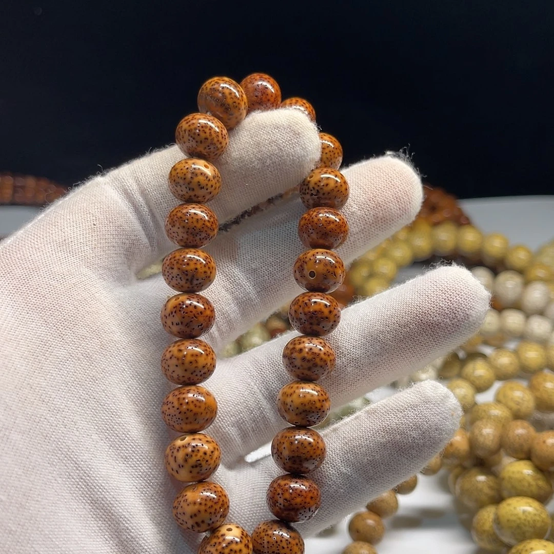 吊坠星月菩提12/10深色花斑虎皮陈籽
