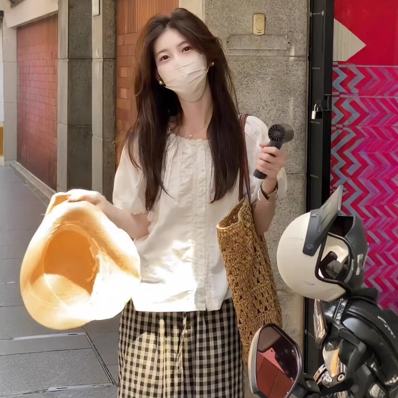 甜美减龄泡泡袖衬衫女夏新款高级感休闲宽松显瘦蕾丝花边小衫上衣