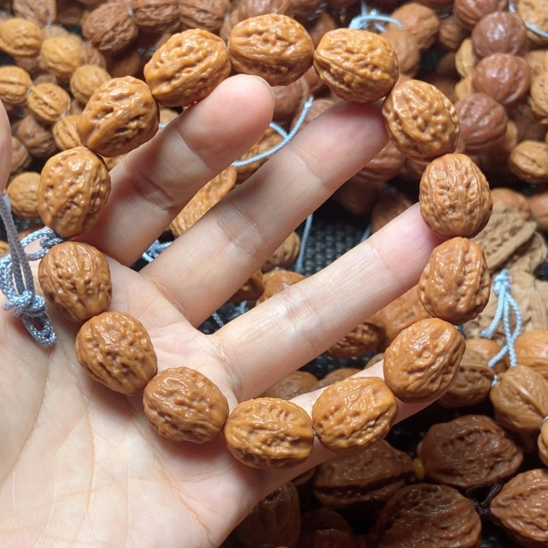 沐***逸桃核吊坠小麦穗手串